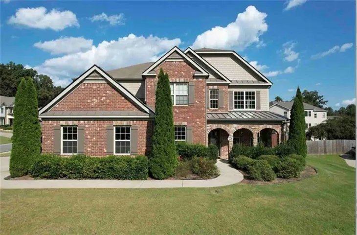 Brick and siding exterior with gabled roof lines