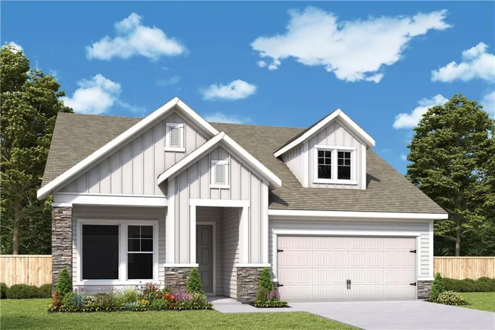 Modern farmhouse-style facade with light siding and stone accents