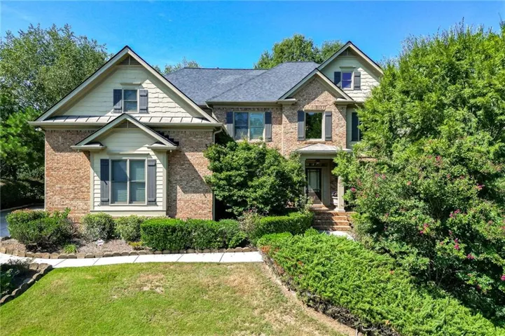 Brick and siding exterior with gabled roof lines