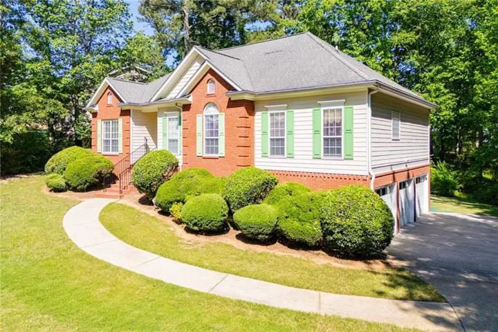 Brick and siding exterior with gabled roof lines