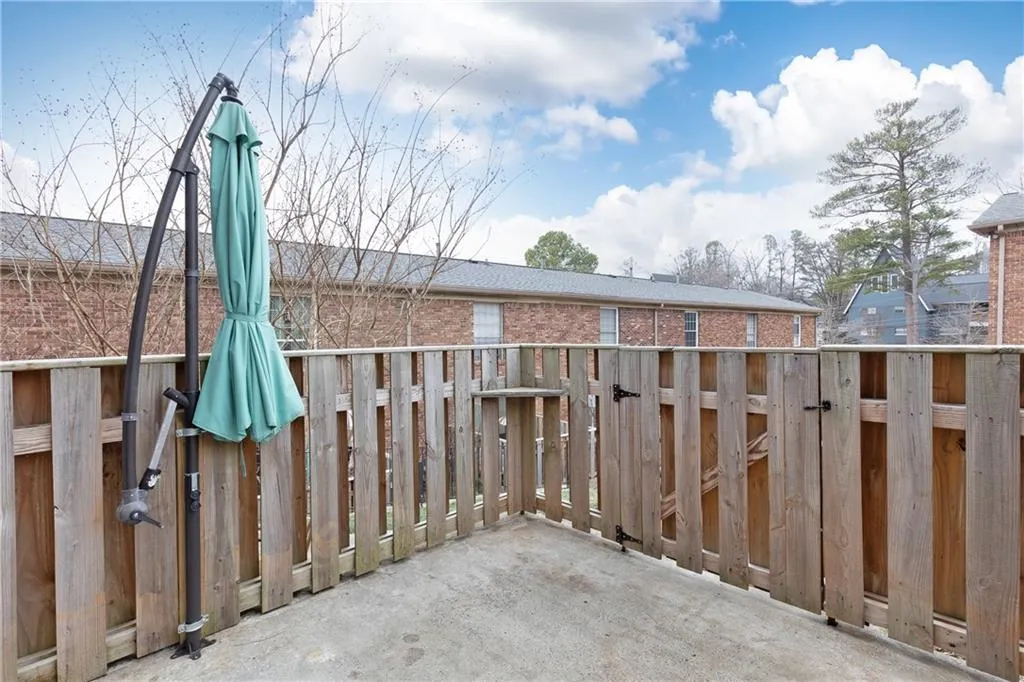 Rear private patio is fenced, allowing for a peaceful retreat or entertaining.