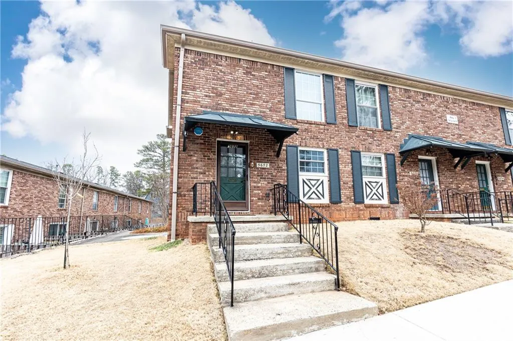 Two story end unit features abundant natural light and has been well-maintained.
