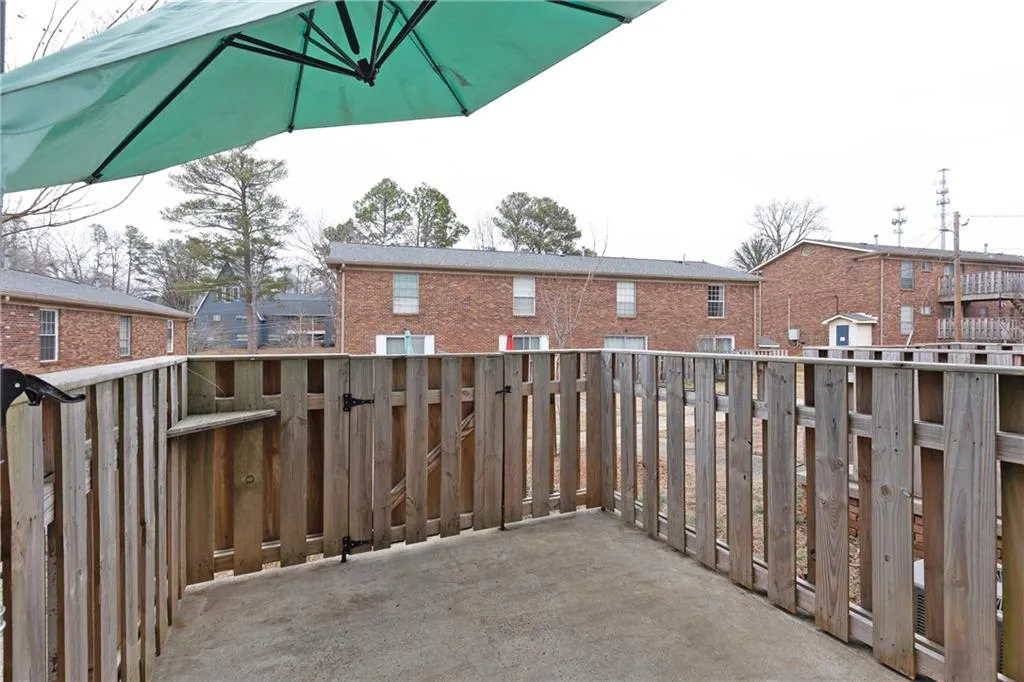 Rear private patio is fenced, allowing for a peaceful retreat or entertaining.