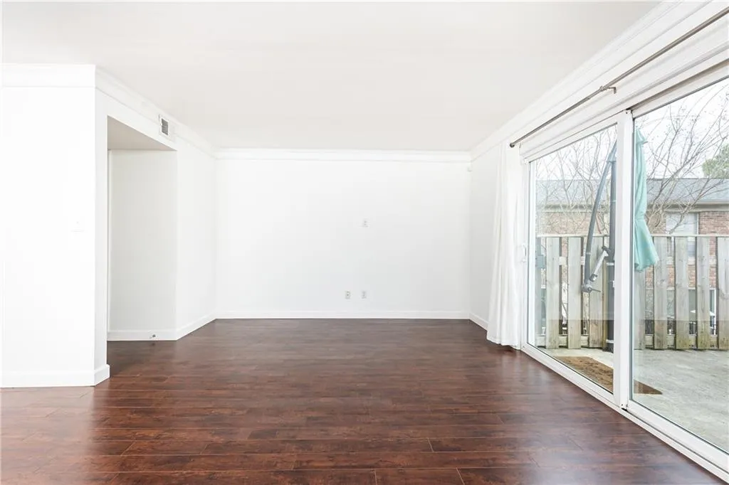 Large living room with sliding glass doors to your private rear patio.
