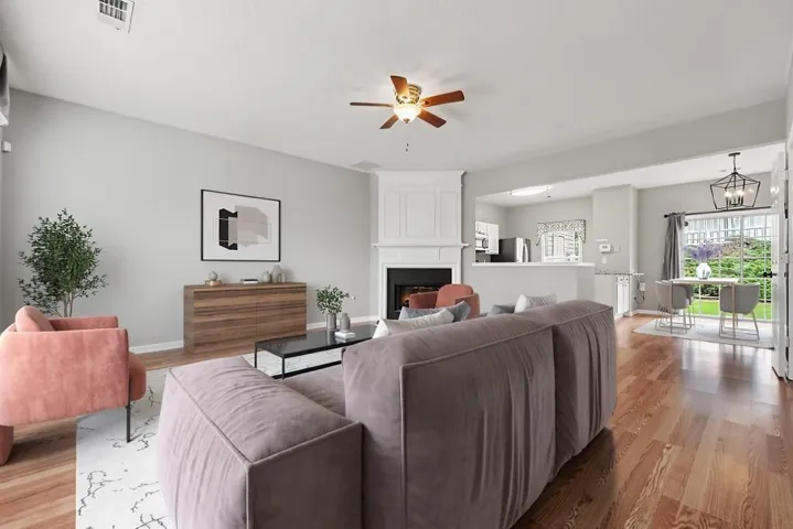 Fireside Family Room Flows Seamlessly Into The Dining Area And Kitchen
