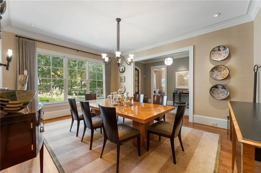This spacious dining room has lots of natural light and beautiful views of the front yard.