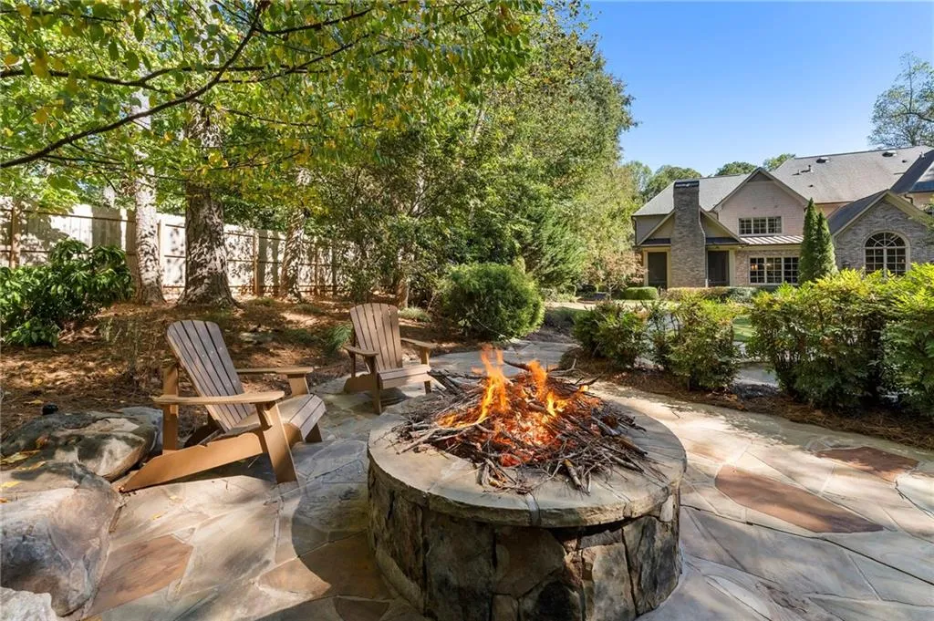 Enjoy a nice fire just adjacent to the pool.