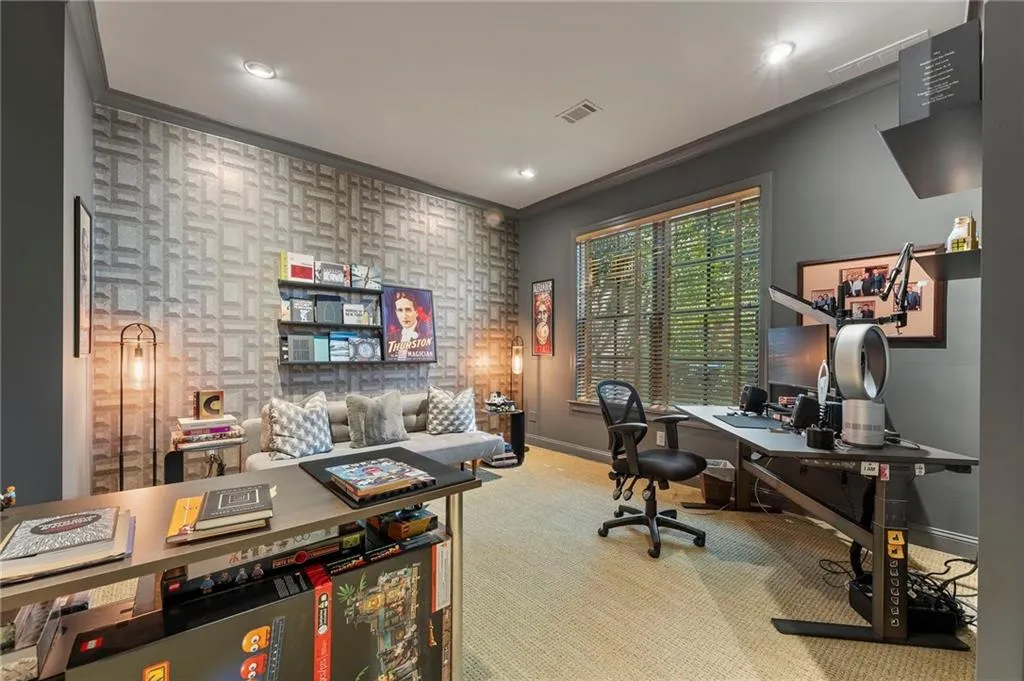 Terrace level bedroom has an ensuite bath, walk-in closet, and large windows.