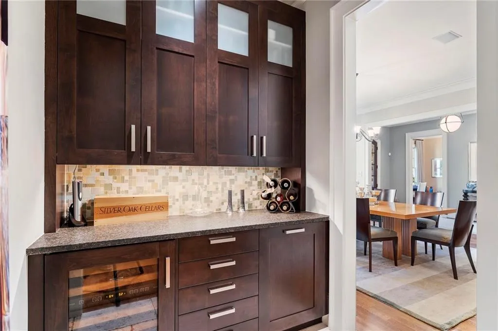 The butler's pantry elegantly connects the dining room and kitchen.