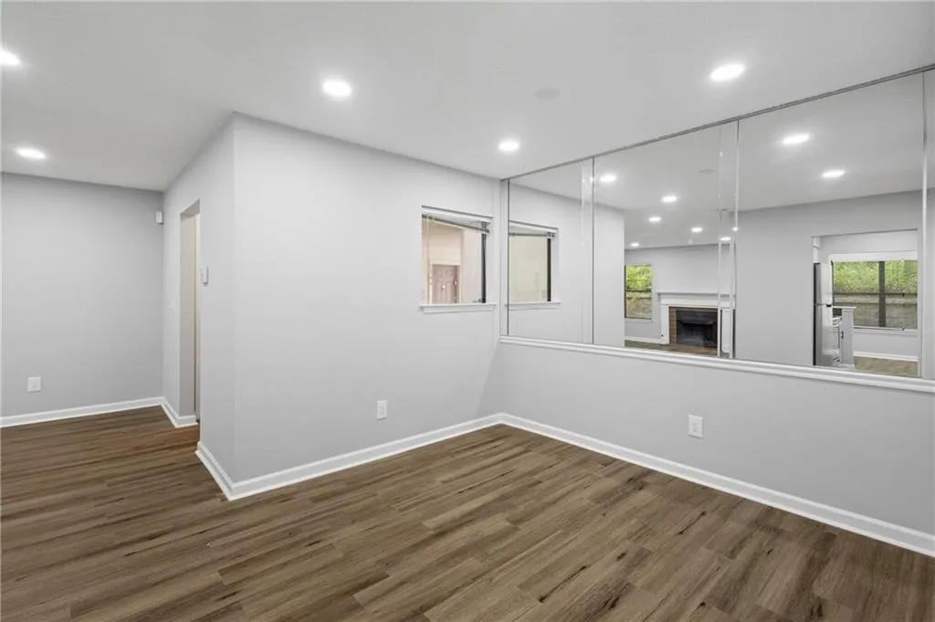 Dining room featuring recessed lighting.