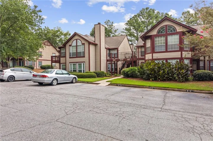 Charming Tudor-inspired residences featuring distinctive half-timbered exteriors, steeply pitched rooflines with decorative gables, and multi-pane windows