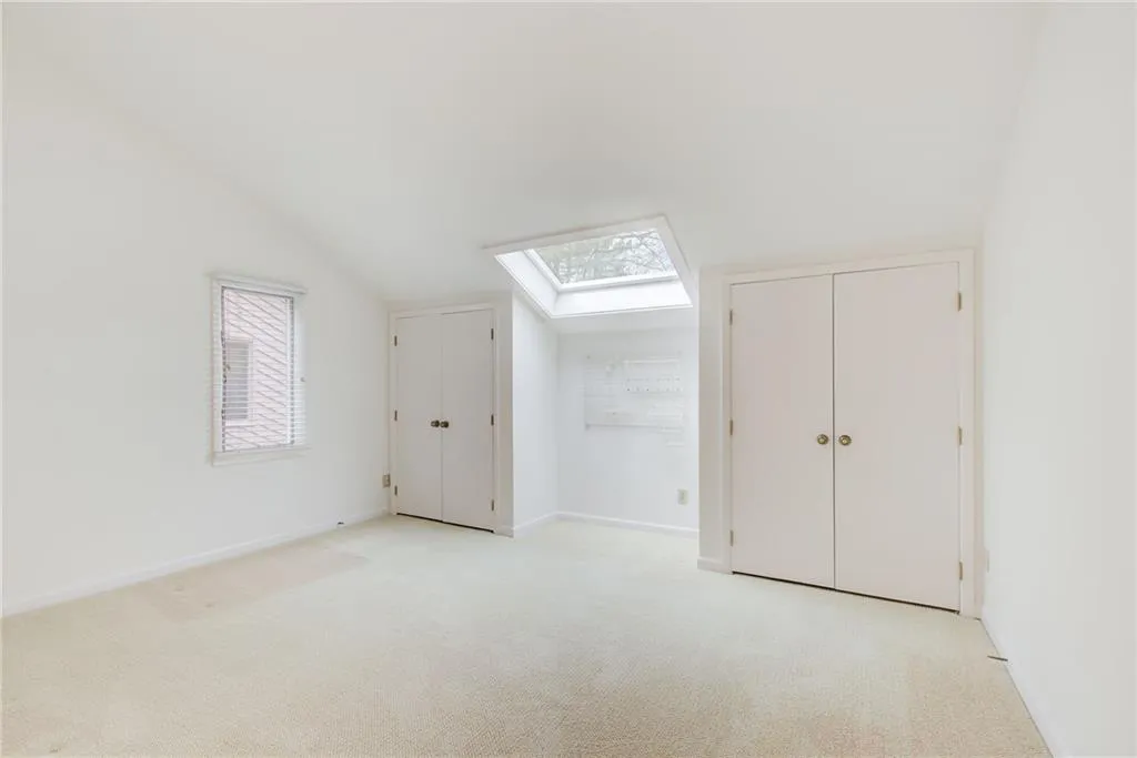 Additional view of first of two upper level guest bedrooms