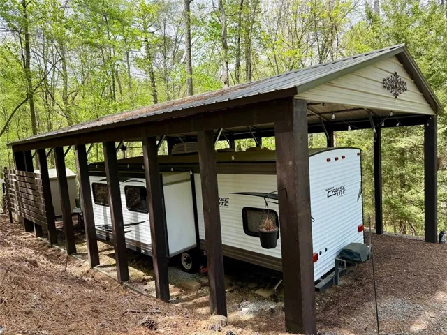25' x 40' Roofover and 27' camper on deeded lot