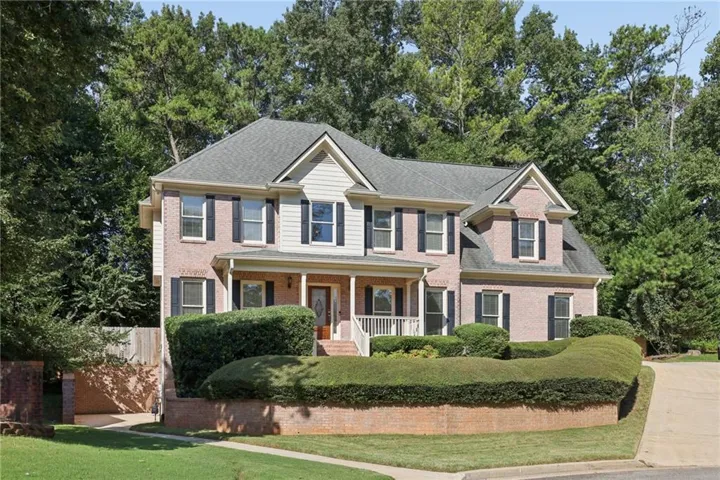 Brick and siding exterior with gabled roof lines