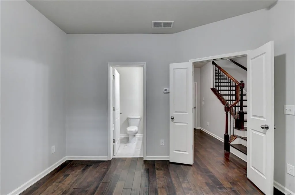The lower level bedroom is perfect for guests or multi-generational living.