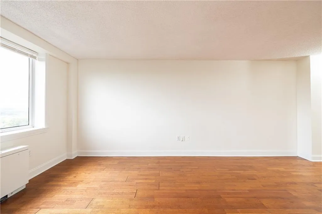 Spacious living area offers plenty of flexibility for furniture placement.