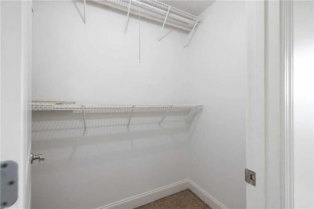 Large bedroom closet provides excellent storage.