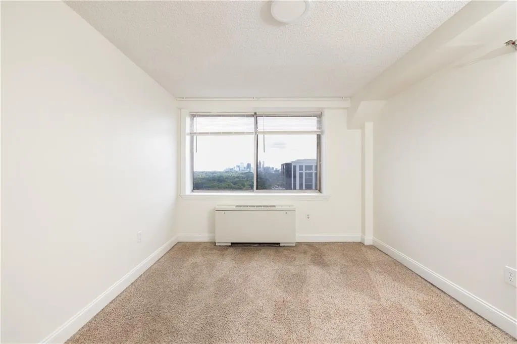Generously sized bedroom with plenty of room.