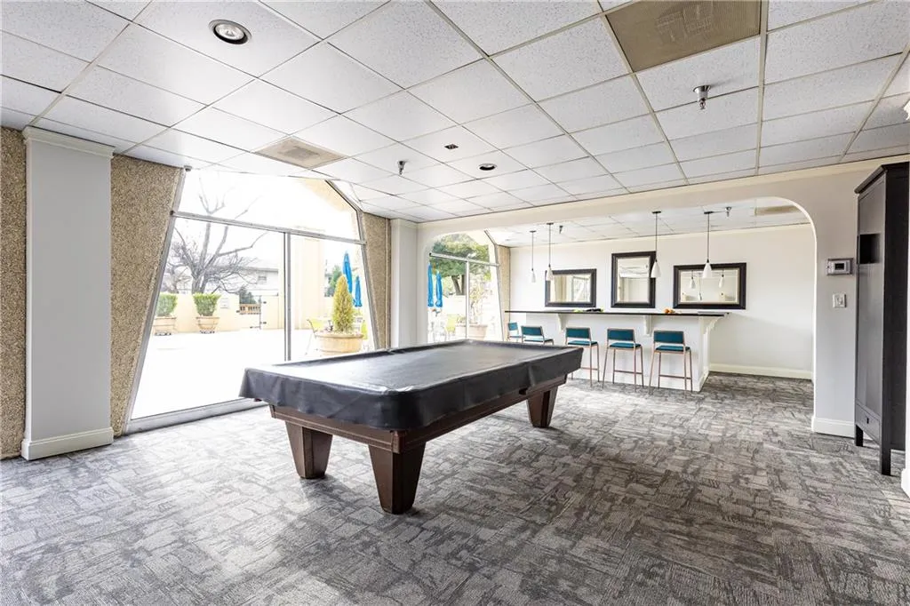 Game room with billiards adds another fun resident amenity.