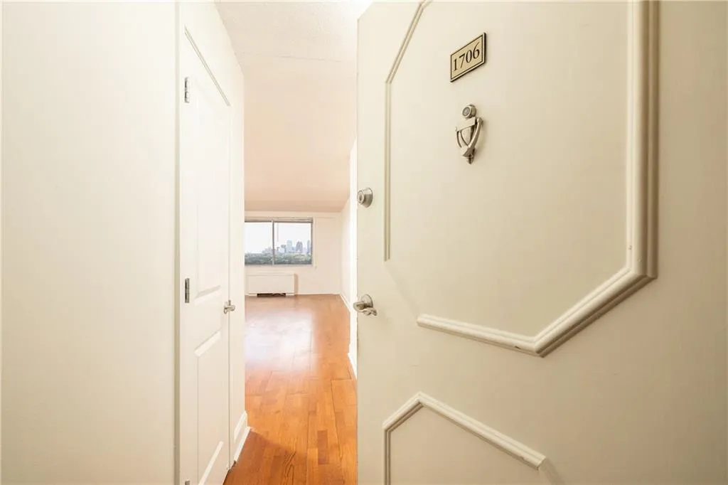 Welcoming entry opens to the light-filled living spaces.