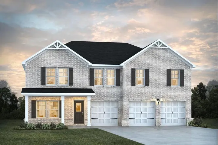 Two-story residence featuring a light brick facade, a covered entry porch, and a black asphalt shingle roof