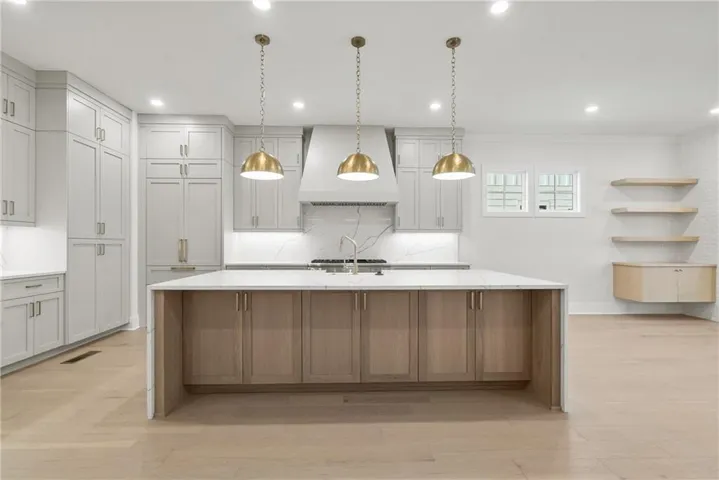 Gorgeous Olmstead home on the Chattahoochee River! Spectacular kitchen! Not actual home.