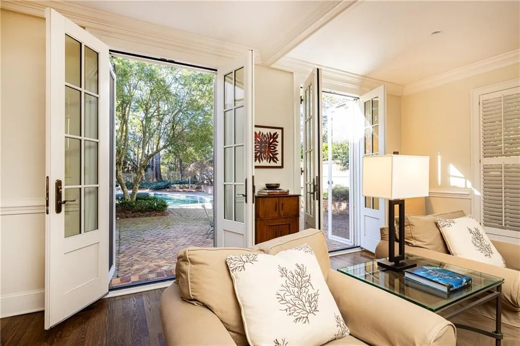 Living room french doors to Patio/pool