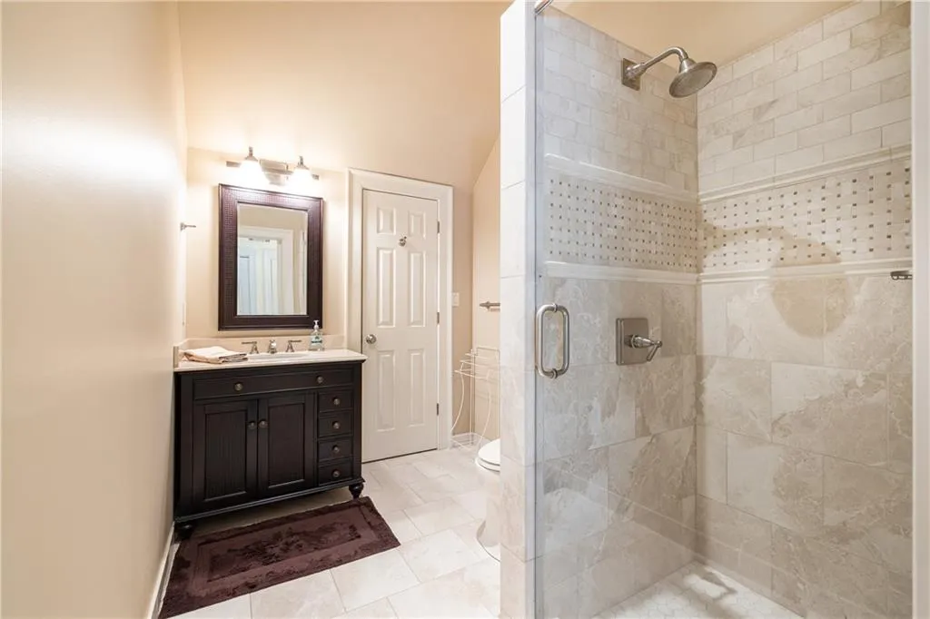 Full bathroom to suite over garage
