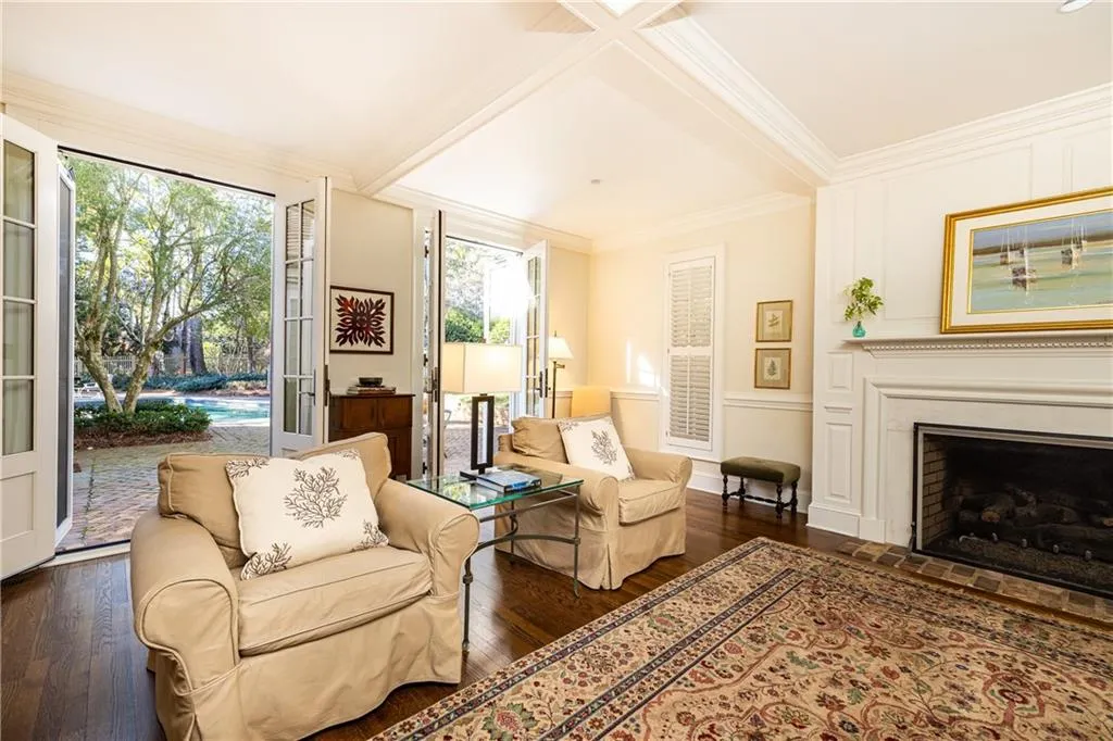 Living room french doors to Patio/pool