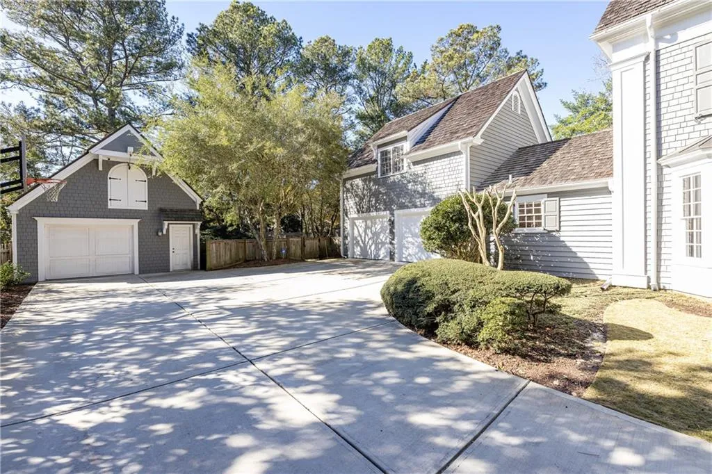 Driveway to 2 car and detached garages