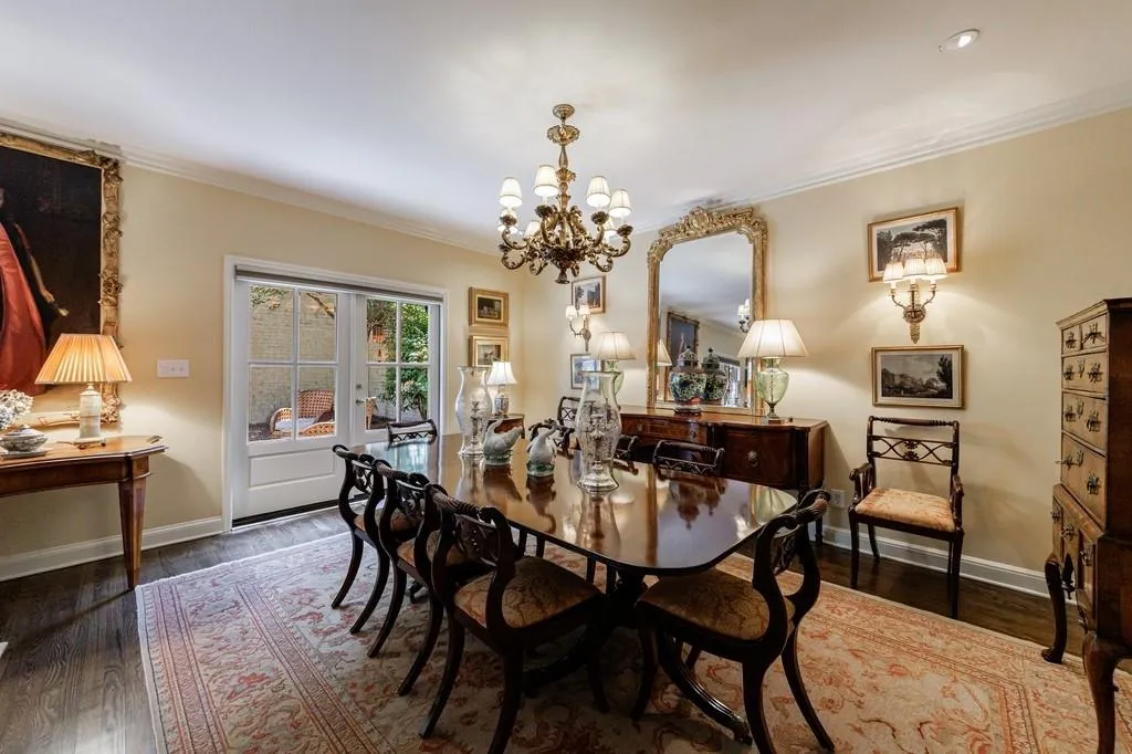 view of formal dining area with new French doors to the courtyard