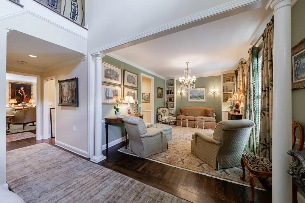 this lovely den off of the foyer was once the formal dining room- so welcoming now used as a casual room.