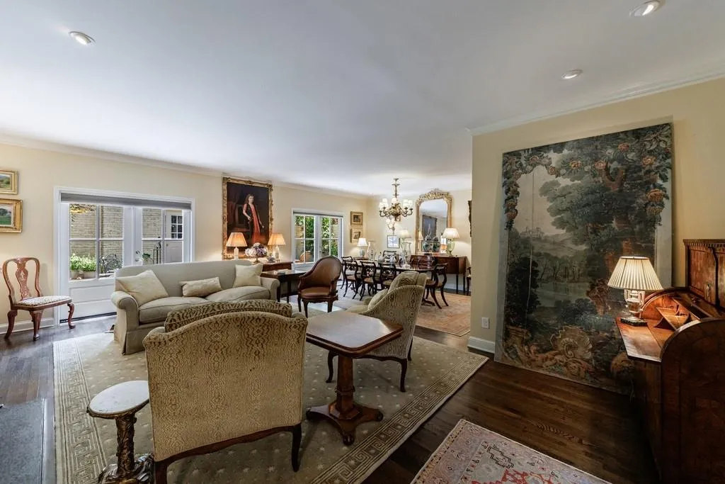 From the entry foyer, enter into the very large living room. The owner/designer split the room into a living room/dining room for a much more inviting feel. This idea also allows for two separate living areas on the main level.