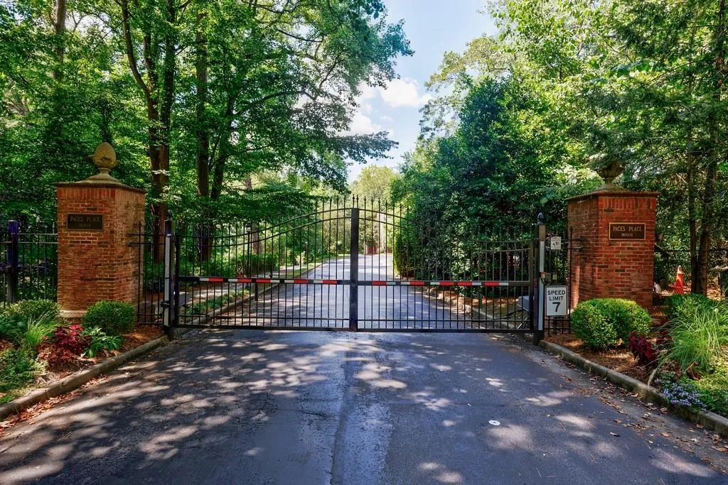 Private secured entry gate into Paces Place