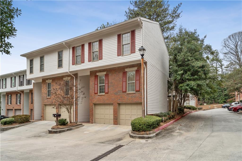 View of front of property with a garage