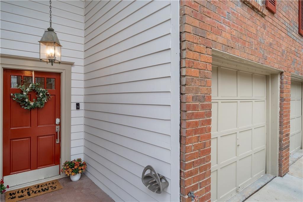 Entrance to property featuring a garage