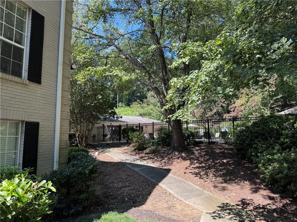 View of courtyard and view to pool and clubhouse.