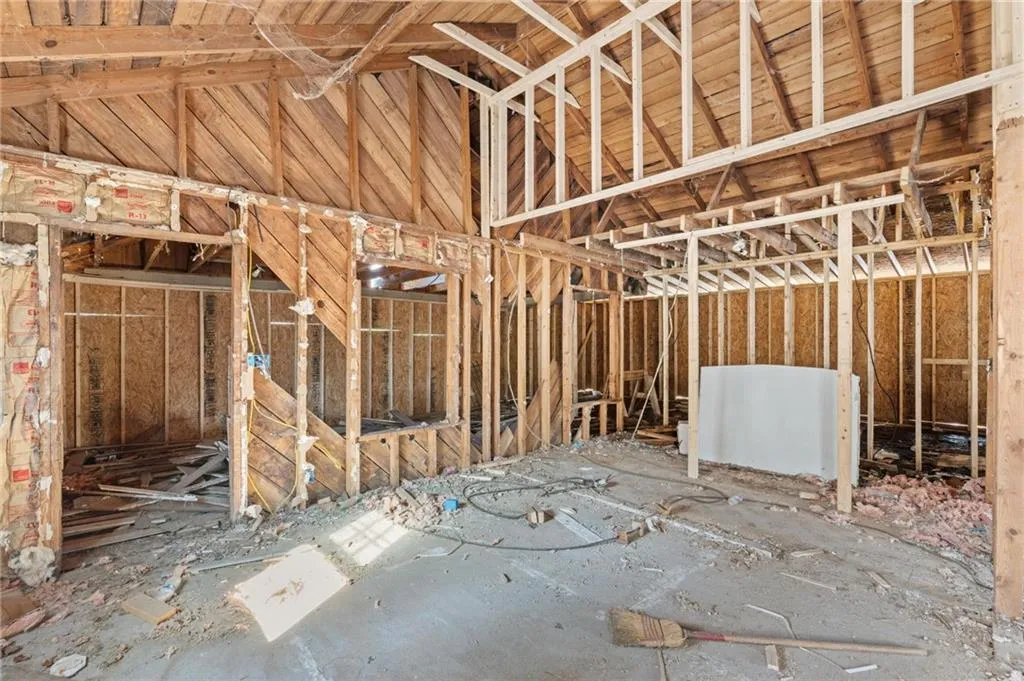 Misc room with a high ceiling