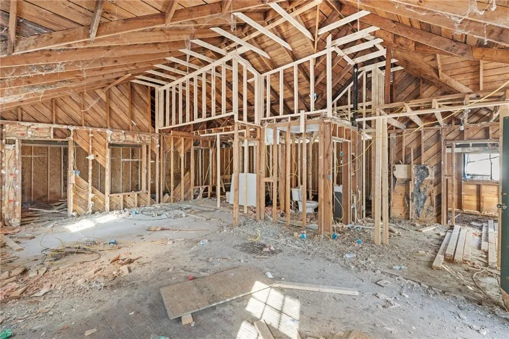 Misc room featuring lofted ceiling