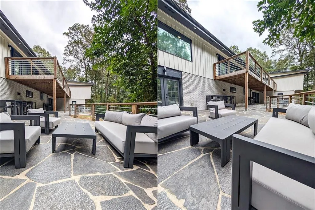 View of patio featuring a deck, an outdoor hangout area, and stairway