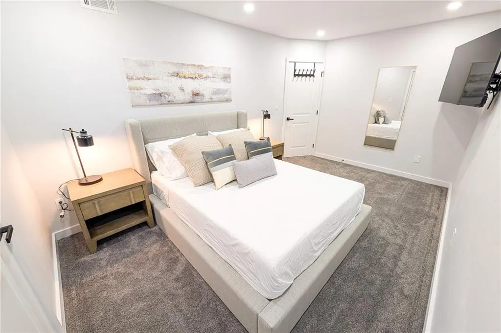 Bedroom featuring carpet floors and recessed lighting