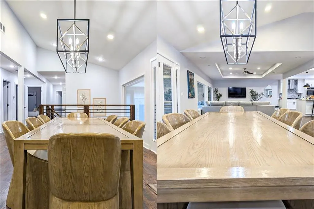 Dining room with a chandelier, recessed lighting, wood finished floors, and lofted ceiling