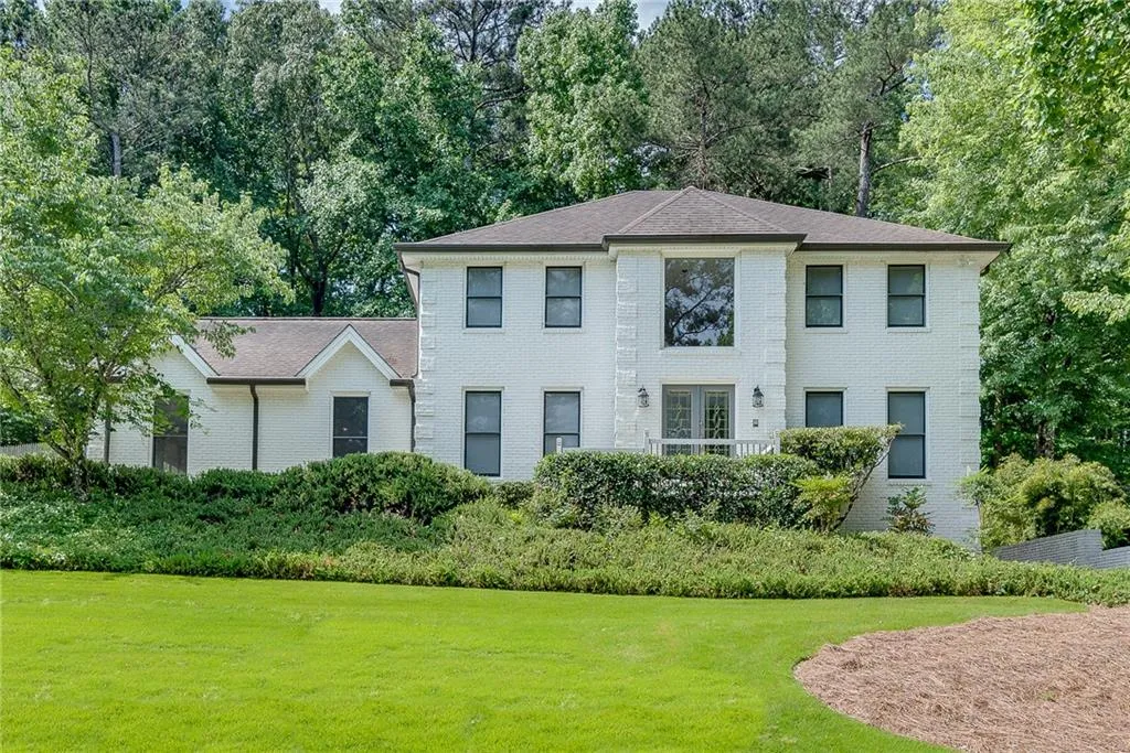 View of front of house with a front yard