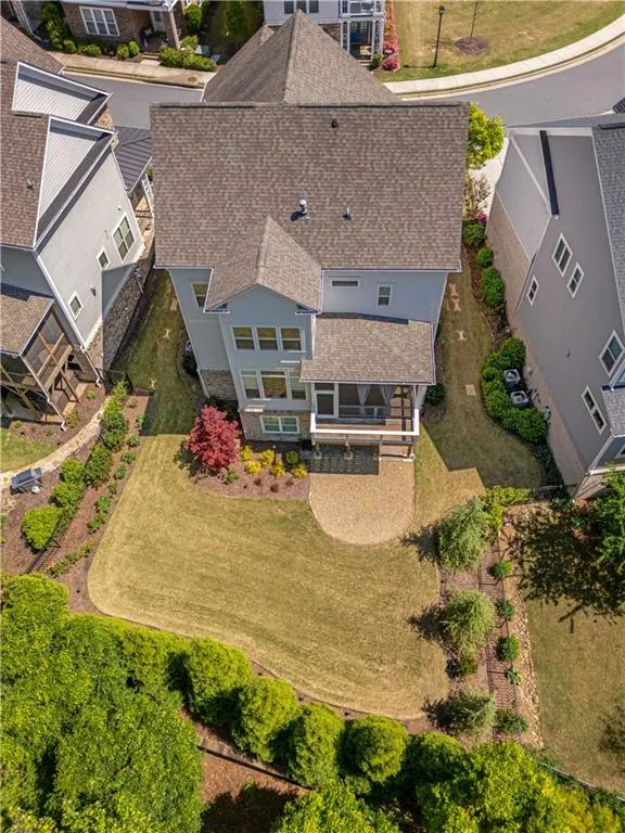 Birds eye view of property with a residential view