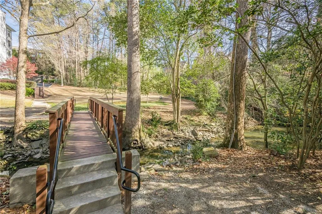 View of home's community featuring view of scattered trees