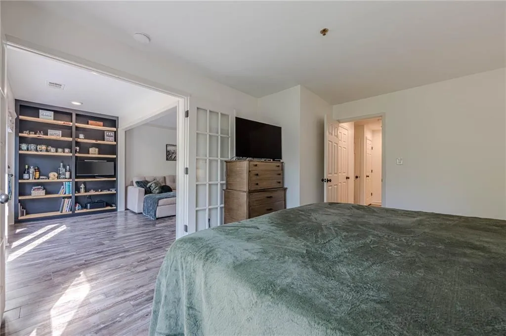 Bedroom featuring wood finished floors