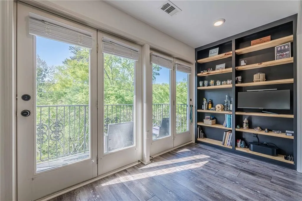 Doorway featuring wood finished floors