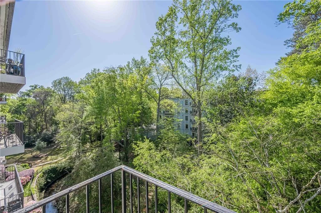 Balcony with view of scattered trees