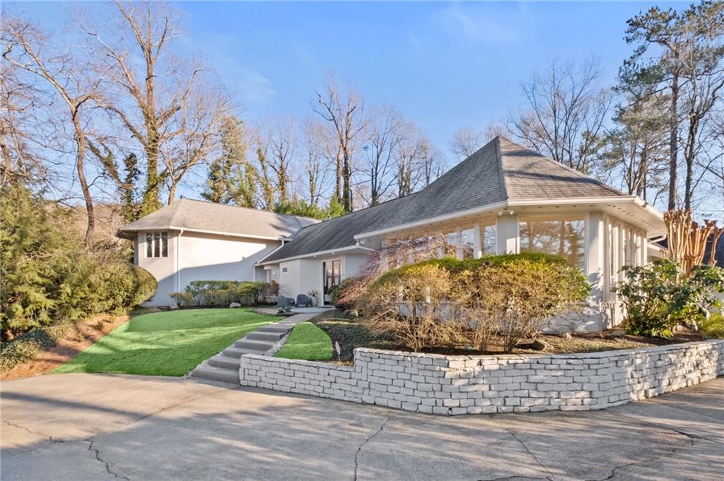 View of front of house with a front lawn