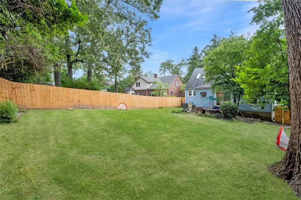 View of fenced backyard